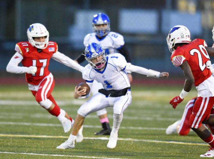 Quarterback+Colin+Wilson+running+with+the+ball+during+Ludlowe%27s+game+against+Greenwich.