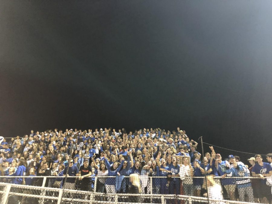 Photo of Ludlowe student bomb squad, The Nest, at a home football game.