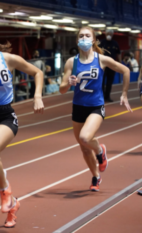 (Bottom Picture) Junior- Coco Norman running 4x200 Anchor Leg