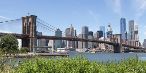 In this New York City Department of Transportation photo, we see the bridges main span of 1595.5 feet. https://www1.nyc.gov/html/dot/html/infrastructure/brooklyn-bridge.shtml